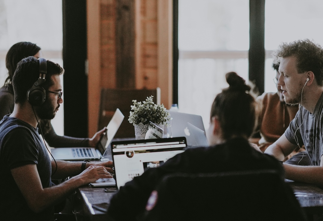Alkymē team collaborating in Los Angeles studio workspace